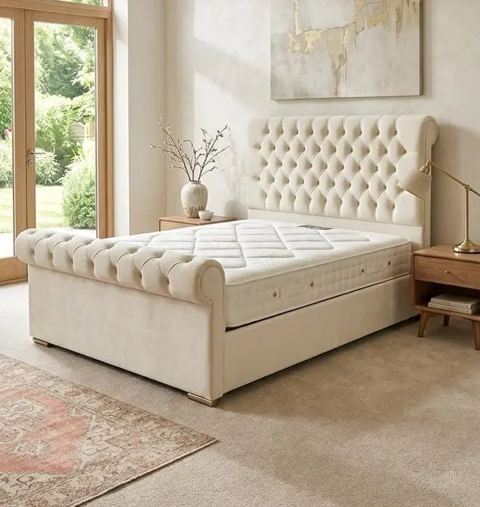 Luxury sleigh bed UK chesterfield upholstered bed frame in elegant cream velvet bedroom