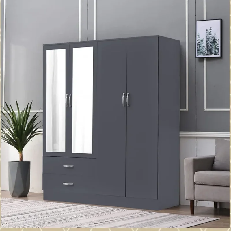 Modern Wardrobes UK | Sliding & Hinged Door Wardrobe Guide | Bedroom Storage Modern 3-door wardrobe with mirror and drawers in a contemporary UK bedroom with neutral decor